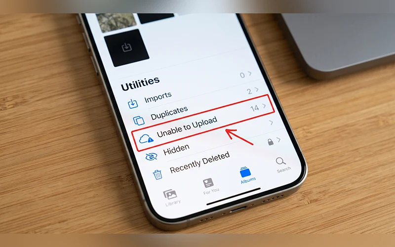 Look for the “Unable to Upload” Album